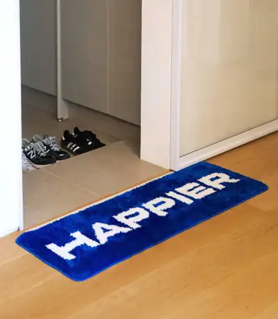 Big happier label ラグ