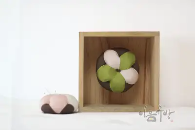 円形針方織(対称形)[つぼみ針方織]