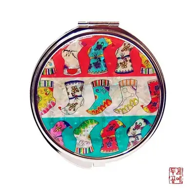 花袜纹样随身镜