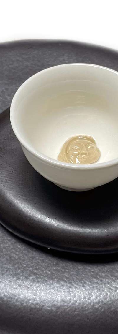 Face-Patterned Roof Tile Ceramic Cup with Gentle Smile
