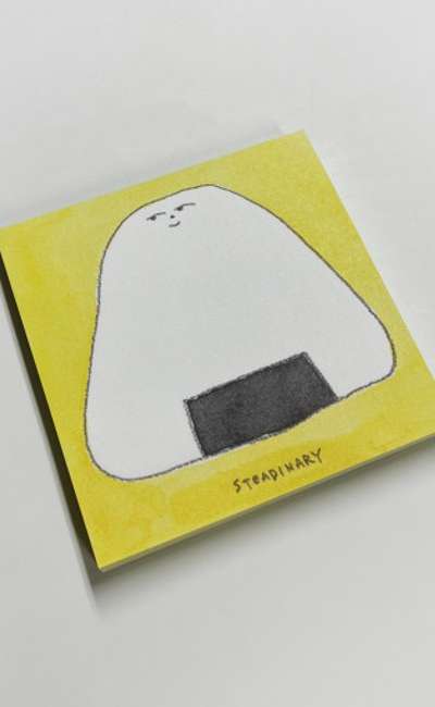 意地悪い表情のおにぎりメモ帳