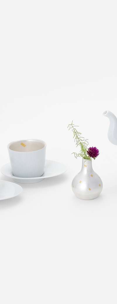 Silver Handle Teapot and Silver Teacup Set