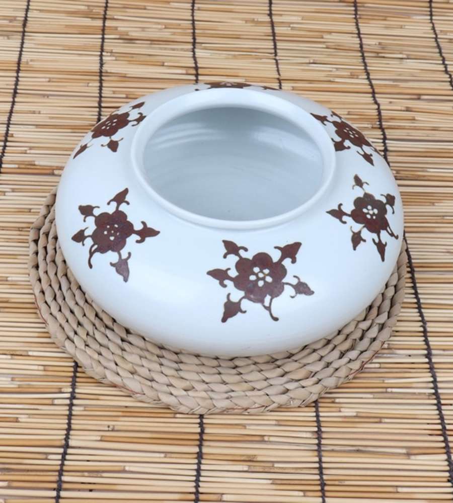 Blue and White Porcelain with Underglaze Copper and Flowering Plant Motif Jar