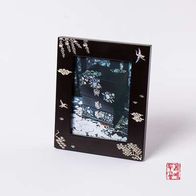 Nacre Frame with Clouds and Cranes